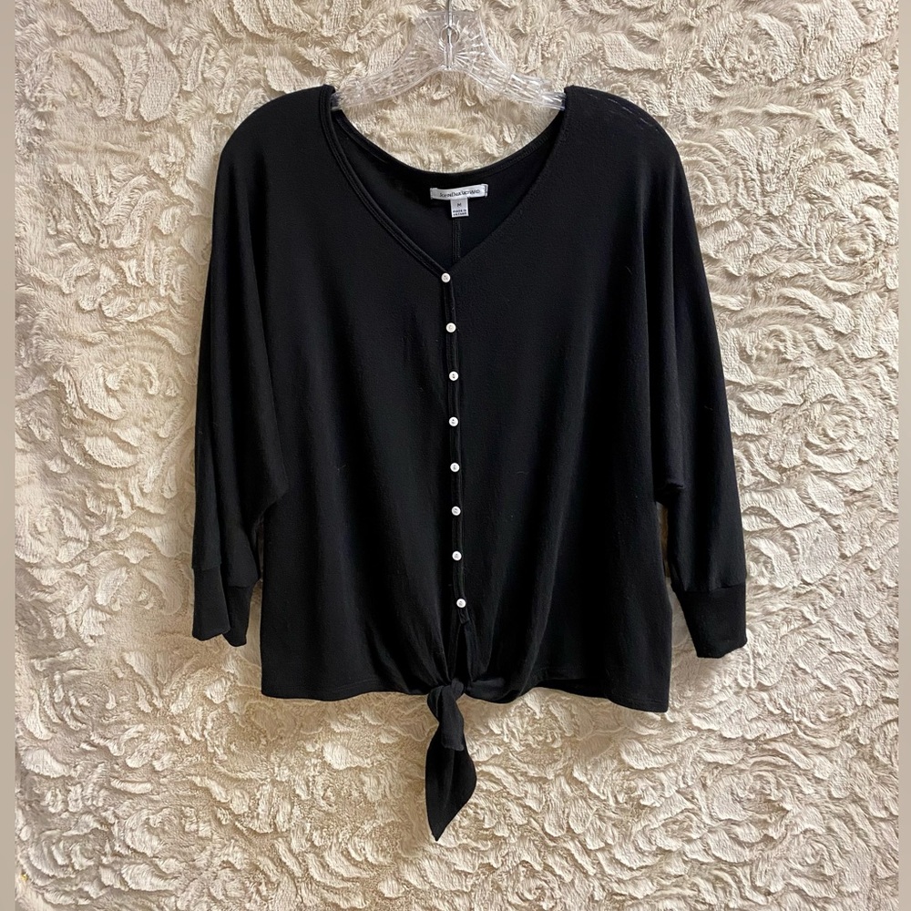 Women’s black tie front top with buttons. Size medium.